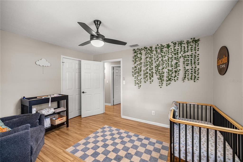 5100 Southeast 44th Avenue Road Ocala, FL 34480 - Photo 29 of 41 a bedroom with furniture and window