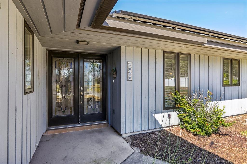 3050 Crump Road Winter Haven, FL 33881 - Photo 11 of 98 a view of a entryway door of the house