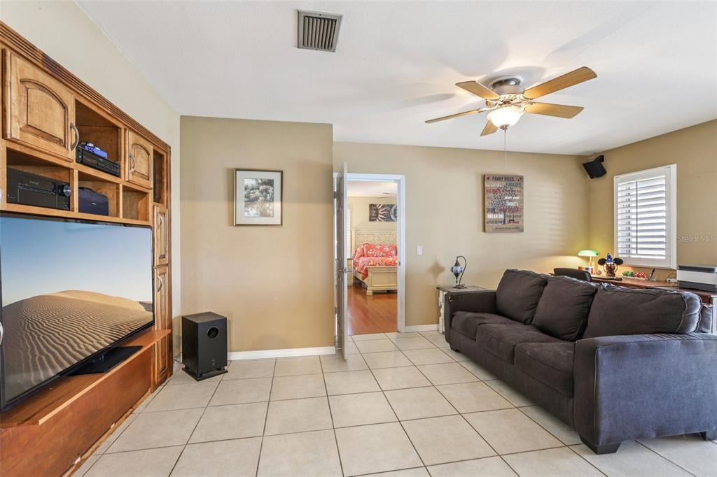 3050 Crump Road Winter Haven, FL 33881 - Photo 45 of 98 a living room with furniture and a window
