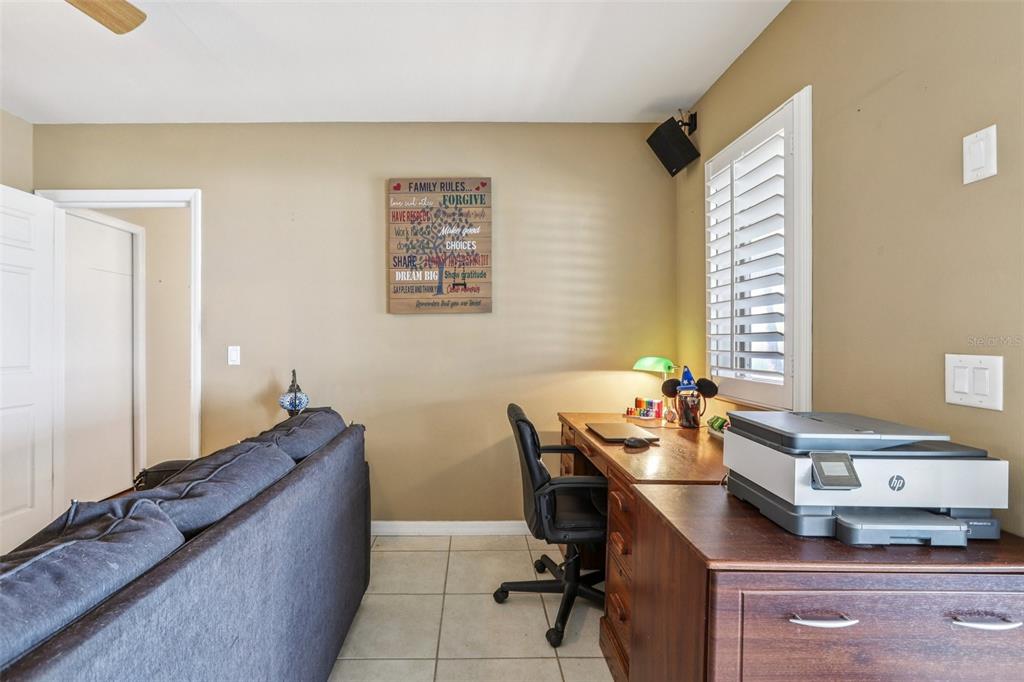 3050 Crump Road Winter Haven, FL 33881 - Photo 48 of 98 a living room with furniture and a window
