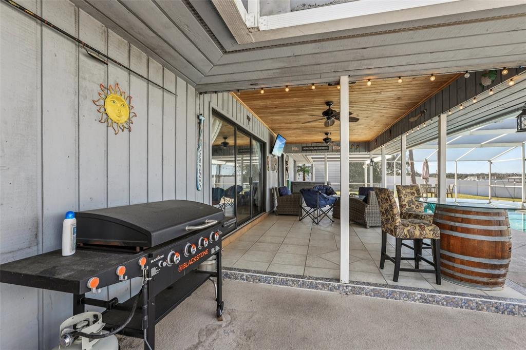 3050 Crump Road Winter Haven, FL 33881 - Photo 64 of 98 a view of a patio with table and chairs