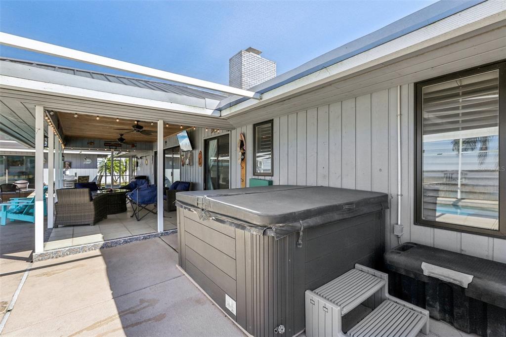 3050 Crump Road Winter Haven, FL 33881 - Photo 71 of 98 a kitchen with a stove and a refrigerator