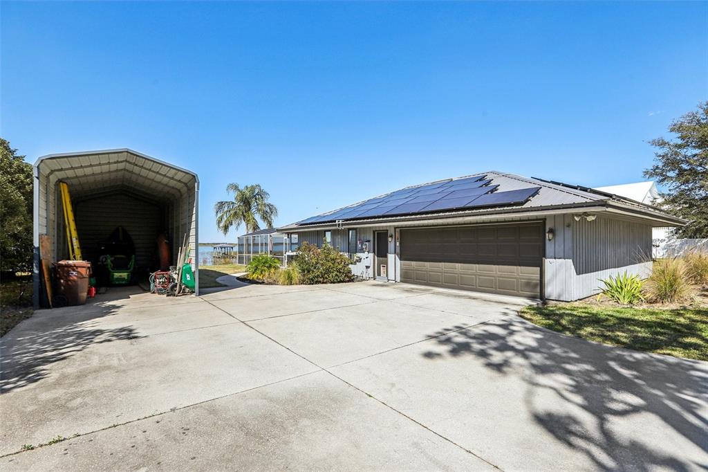 3050 Crump Road Winter Haven, FL 33881 - Photo 88 of 98 a view of a house with a patio