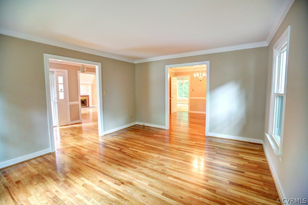 6001 Lansgate Road Midlothian, VA 23112 - Photo 8 of 24 a view of empty room with wooden floor and fan
