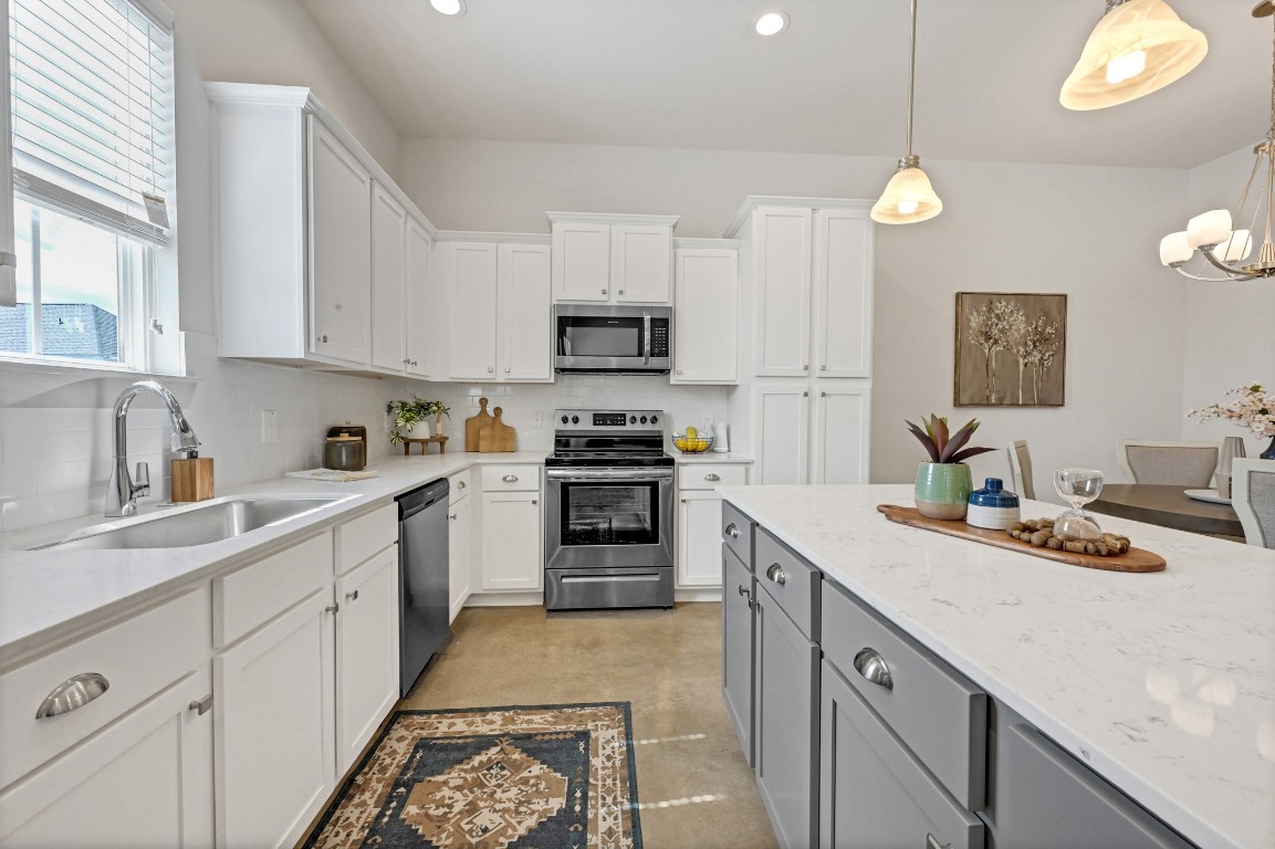 33455 Buckshot Lane, Unit 52 Spring, TX 77382 - Photo 7 of 25 a kitchen with a sink cabinets and window