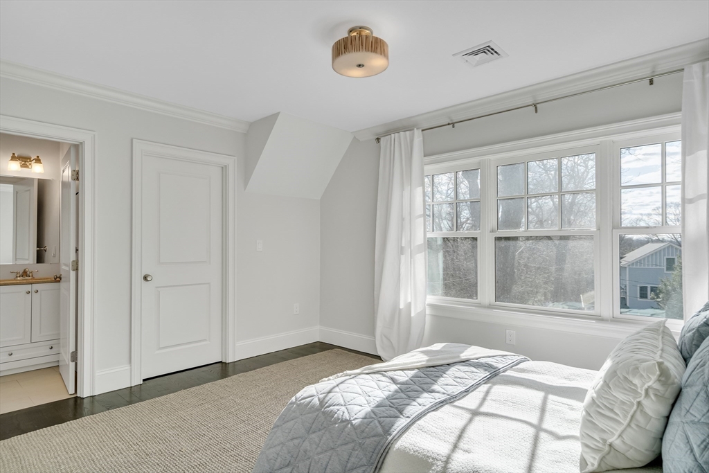 80 Buckman Drive Lexington, MA 02421 - Photo 12 of 29 a bedroom with a bed and a window