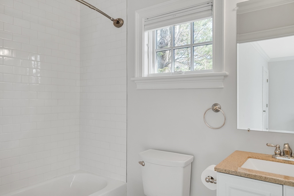 80 Buckman Drive Lexington, MA 02421 - Photo 13 of 29 a bathroom with a toilet and a sink