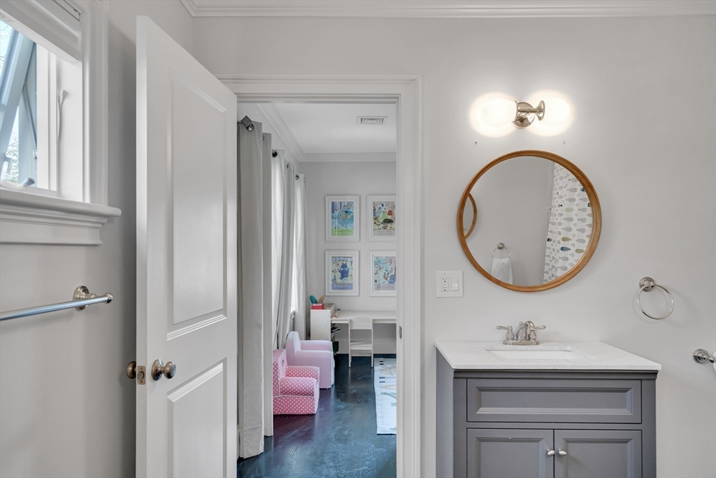 80 Buckman Drive Lexington, MA 02421 - Photo 16 of 29 a bathroom with a sink a toilet and a mirror