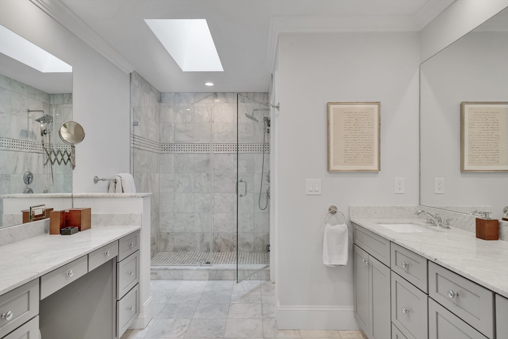 80 Buckman Drive Lexington, MA 02421 - Photo 19 of 29 a bathroom with a shower sink and mirror