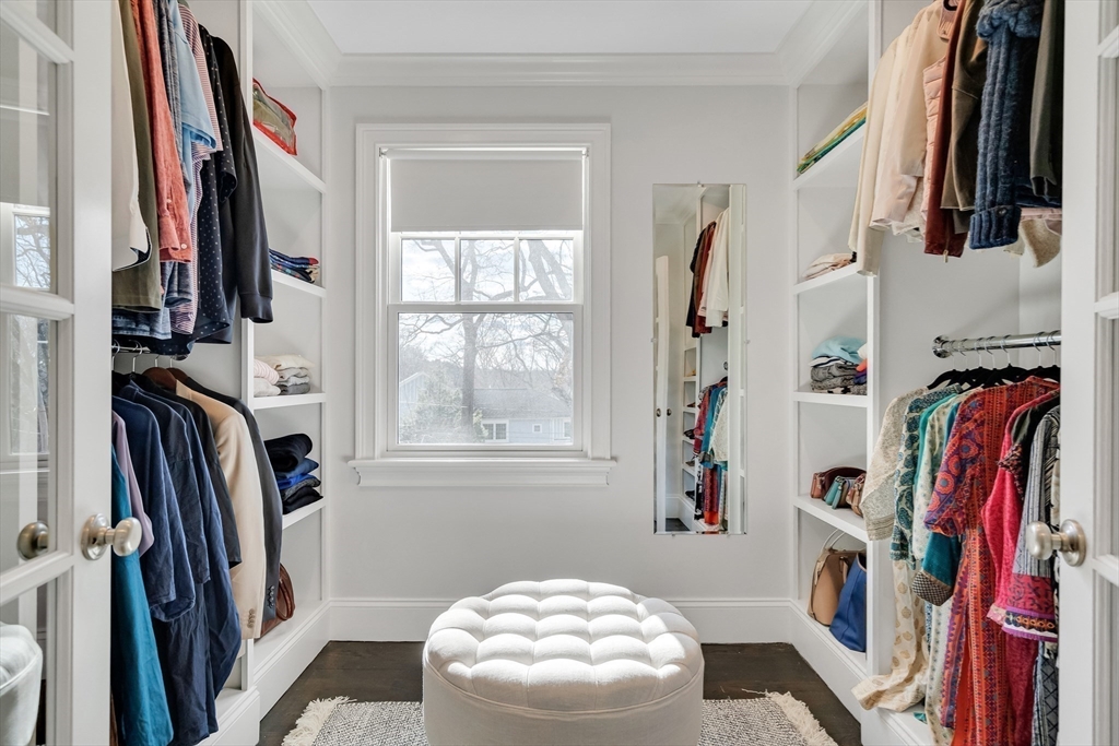 80 Buckman Drive Lexington, MA 02421 - Photo 20 of 29 a view of walk in closet with clothes and shoes