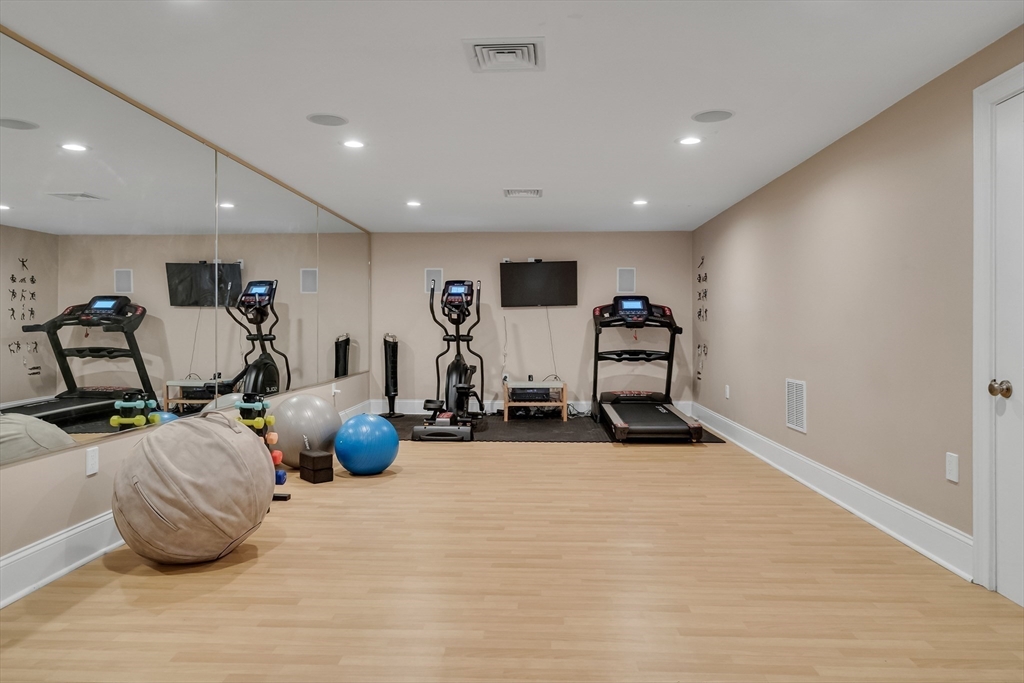 80 Buckman Drive Lexington, MA 02421 - Photo 23 of 29 a view of a room with gym equipment