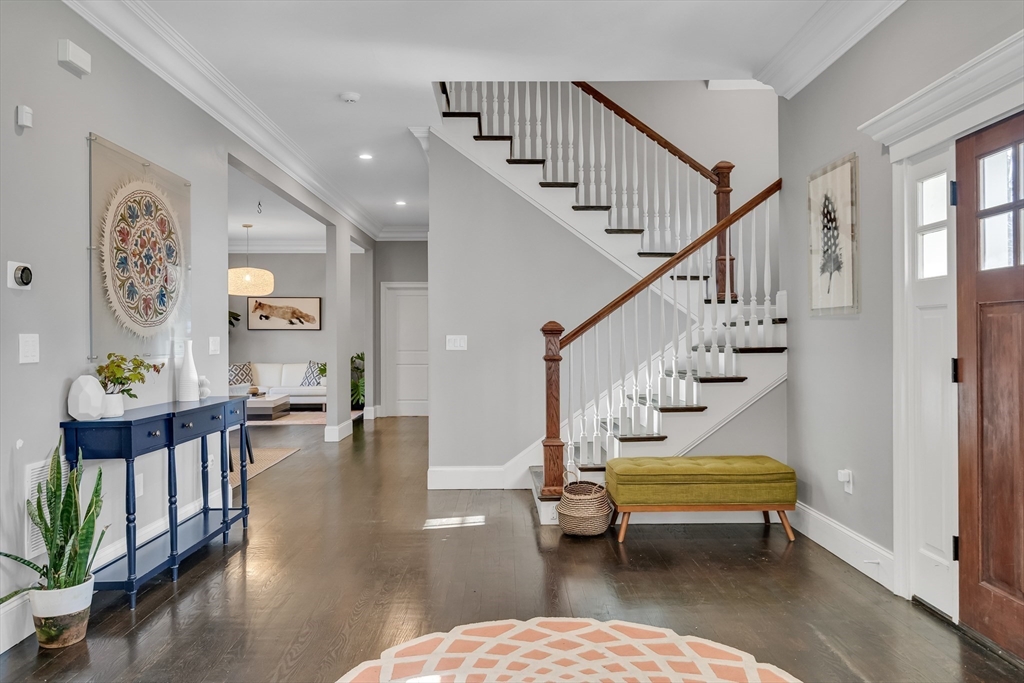80 Buckman Drive Lexington, MA 02421 - Photo 3 of 29 a living room with furniture and wooden floor