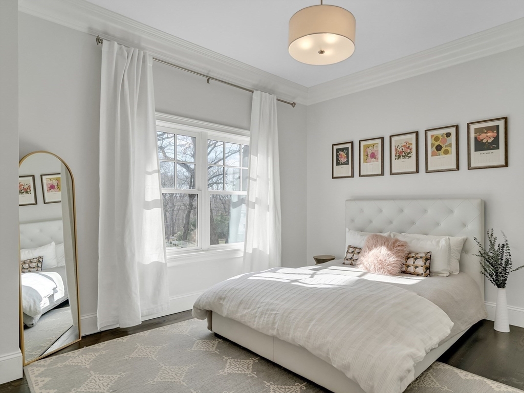 80 Buckman Drive Lexington, MA 02421 - Photo 10 of 29 a bedroom with a bed and a window