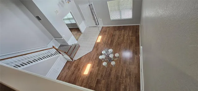 a view of entryway with wooden floor