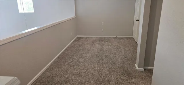 a view of a livingroom with wooden floor