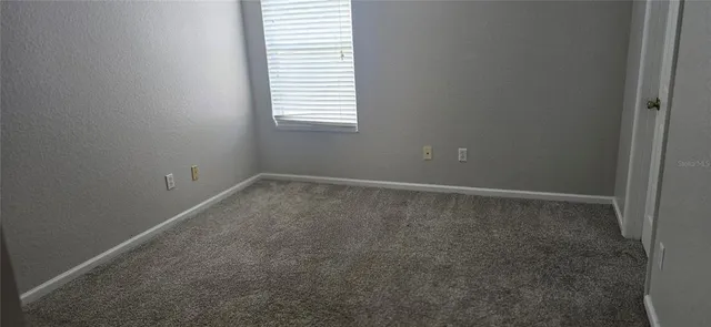 a view of a livingroom with wooden floor