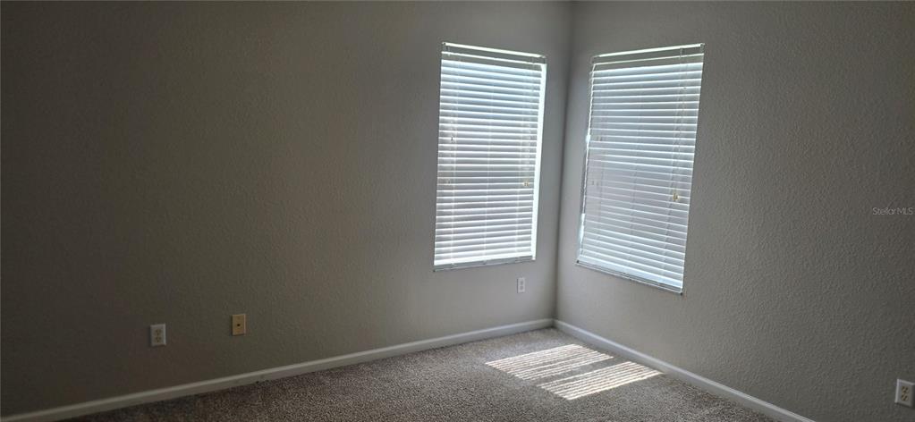 13426 Chariho Lane Windermere, FL 34786 - Photo 39 of 80 an empty room with windows