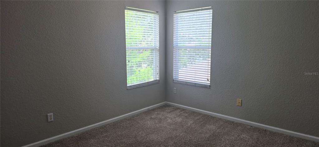13426 Chariho Lane Windermere, FL 34786 - Photo 40 of 80 a view of an empty room with a window