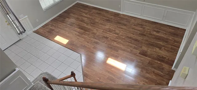 a kitchen with granite countertop a stove and a microwave
