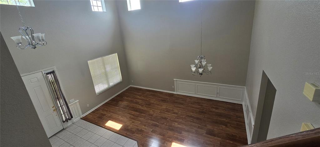 13426 Chariho Lane Windermere, FL 34786 - Photo 47 of 80 a view of a hallway with wooden floor