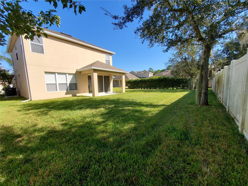 13426 Chariho Lane Windermere, FL 34786 - Photo 5 of 80 a view of a house with a yard