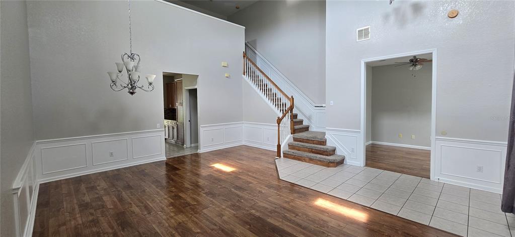 13426 Chariho Lane Windermere, FL 34786 - Photo 55 of 80 a view of entryway and hall with wooden floor