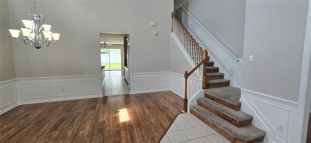 13426 Chariho Lane Windermere, FL 34786 - Photo 62 of 80 a view of entryway and hall with wooden floor