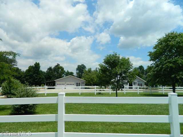 7556 Dubach Road Summerfield, NC 27358 - Photo 3 of 16 Land. The well thought out positioning of fencing, outbuildings, home, gardens and gates makes this easy to maintain, protective of horses/livestock thus rendering a peaceful serene setting.
