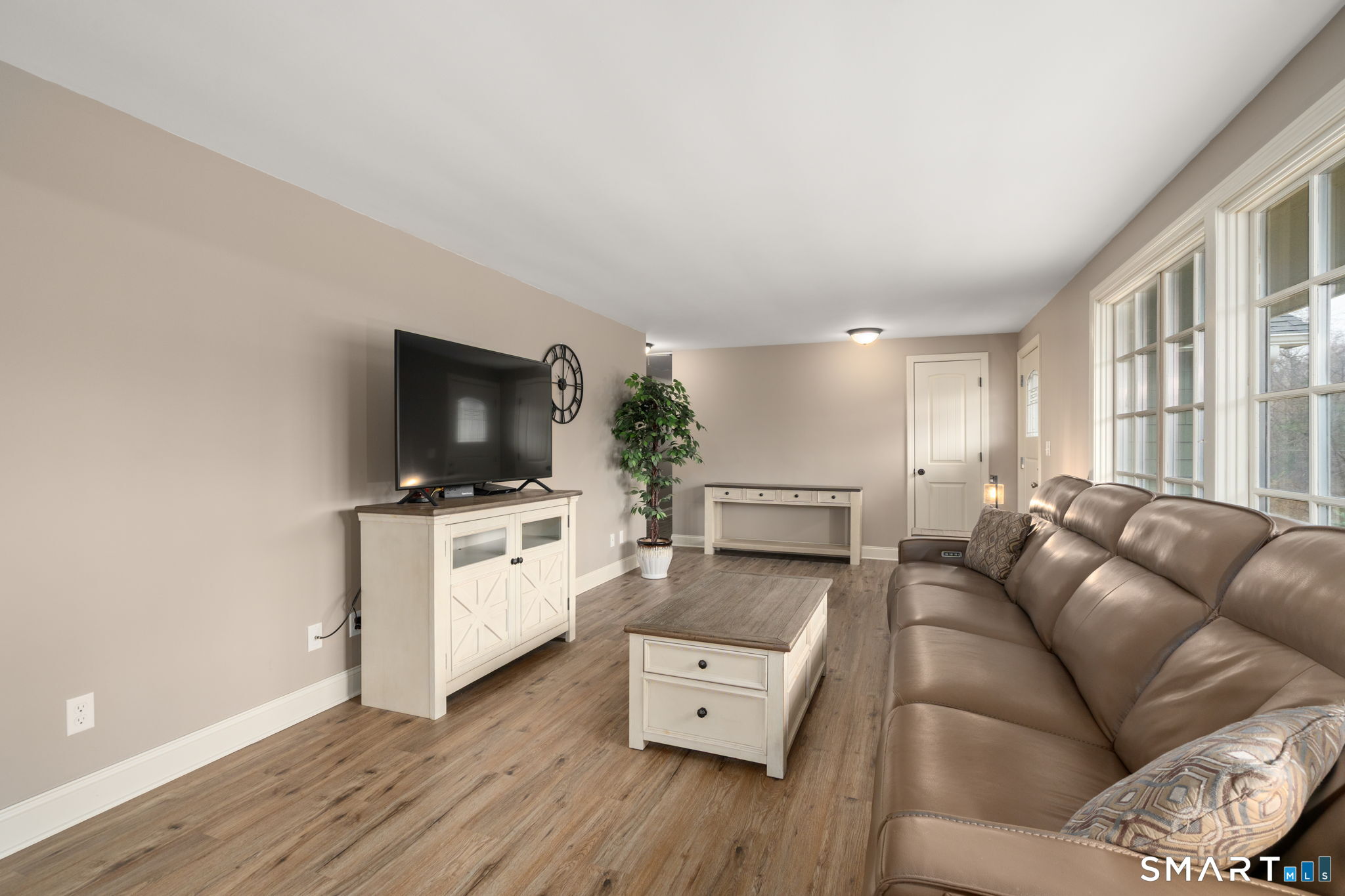 183 Old Hall Road Woodstock, CT 06281 - Photo 19 of 29 a living room with furniture and a flat screen tv