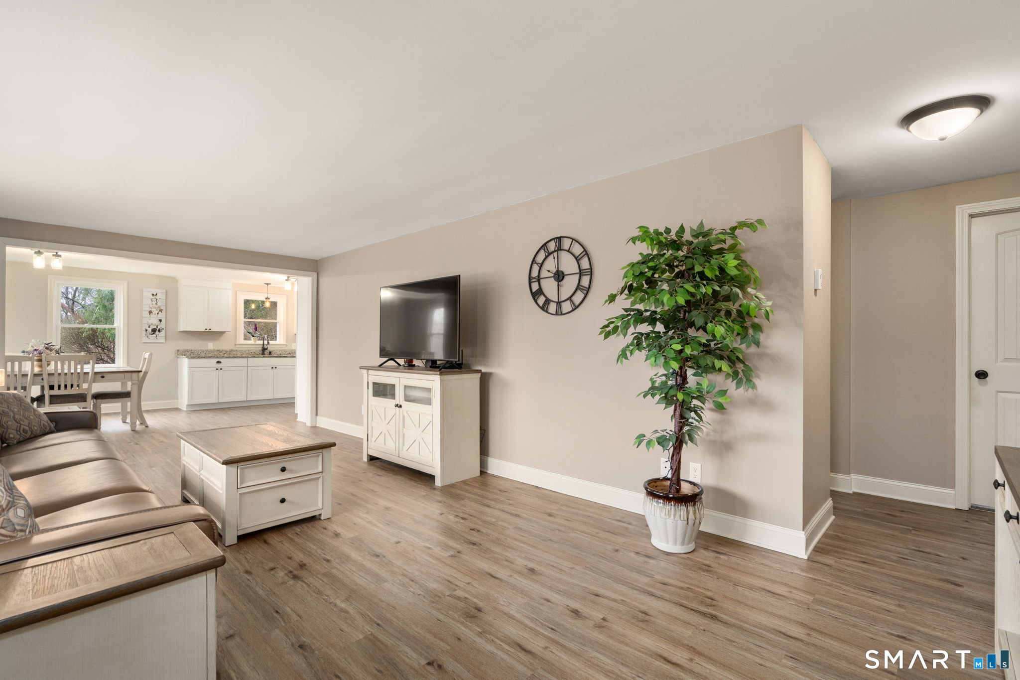 183 Old Hall Road Woodstock, CT 06281 - Photo 20 of 29 a living room with furniture and a flat screen tv