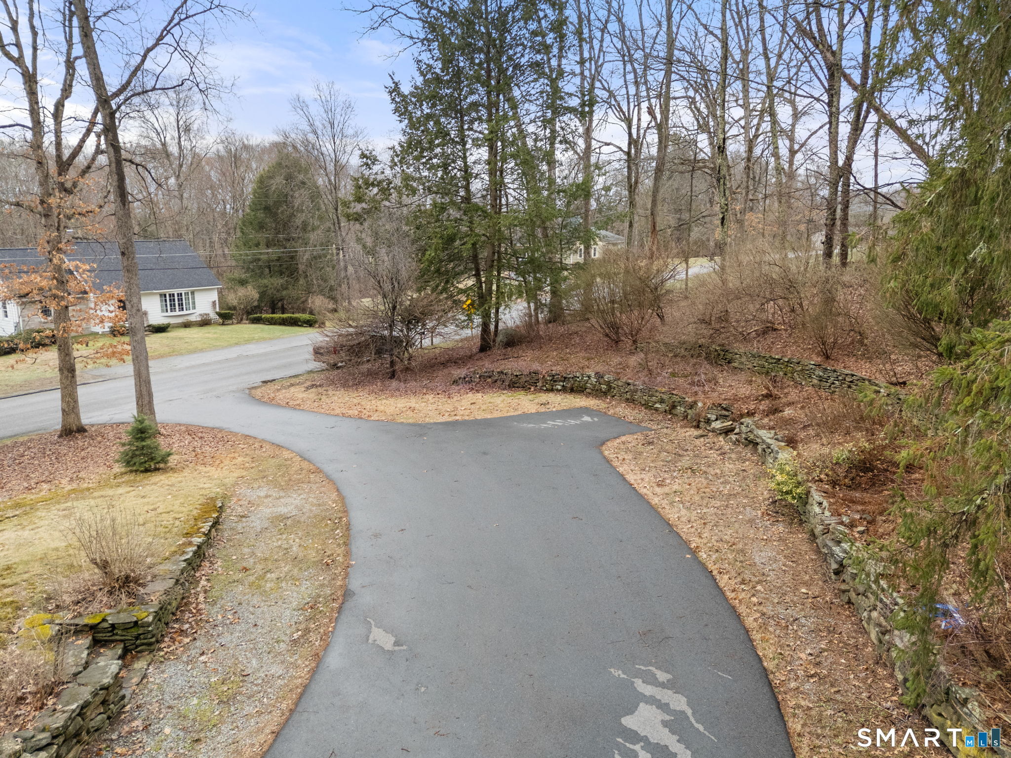 183 Old Hall Road Woodstock, CT 06281 - Photo 2 of 29 a view of a yard with wooden fence
