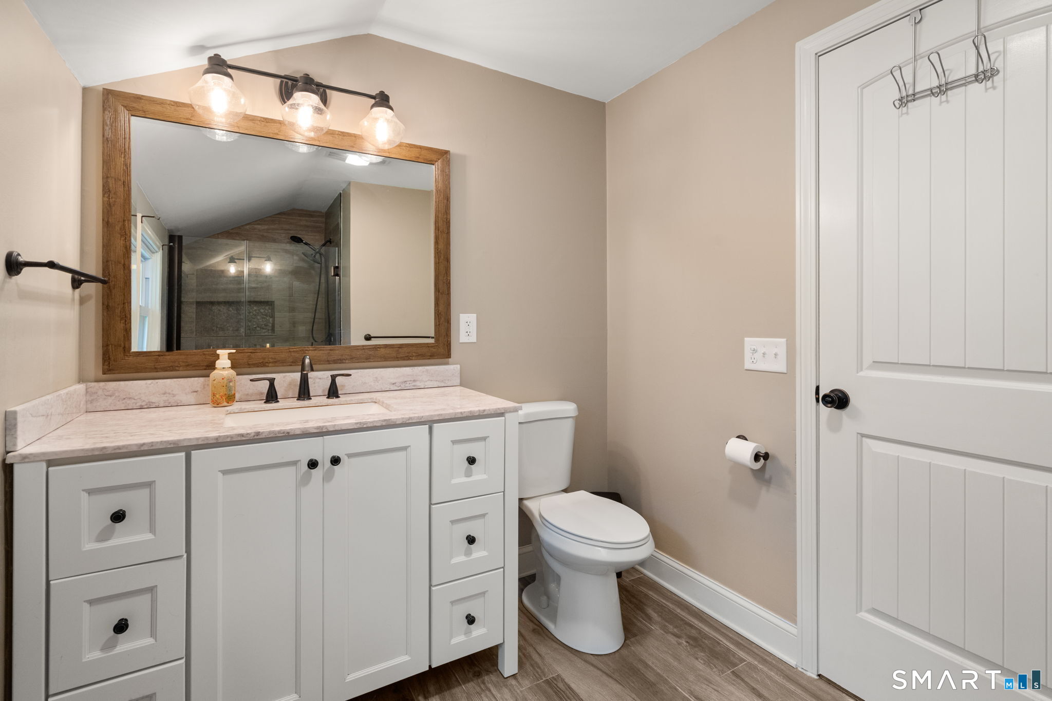 183 Old Hall Road Woodstock, CT 06281 - Photo 21 of 29 a spacious bathroom with a granite countertop sink toilet and shower