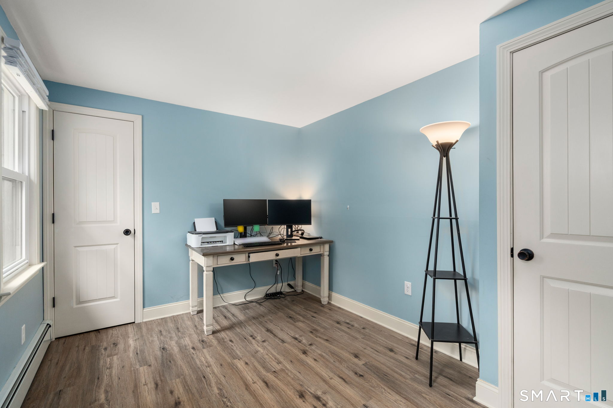 183 Old Hall Road Woodstock, CT 06281 - Photo 27 of 29 a view of a workspace with furniture and wooden floor