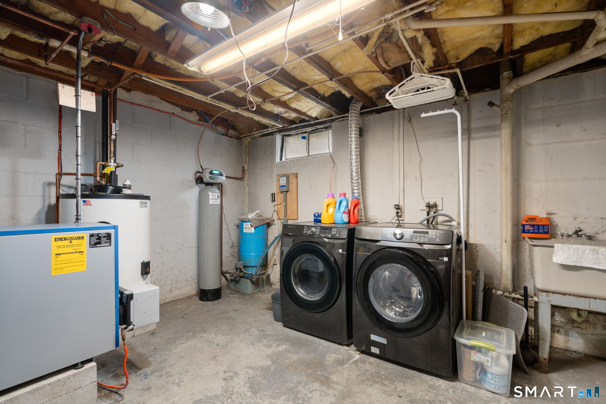 183 Old Hall Road Woodstock, CT 06281 - Photo 6 of 29 a view of storage and utility room with washer and dryer