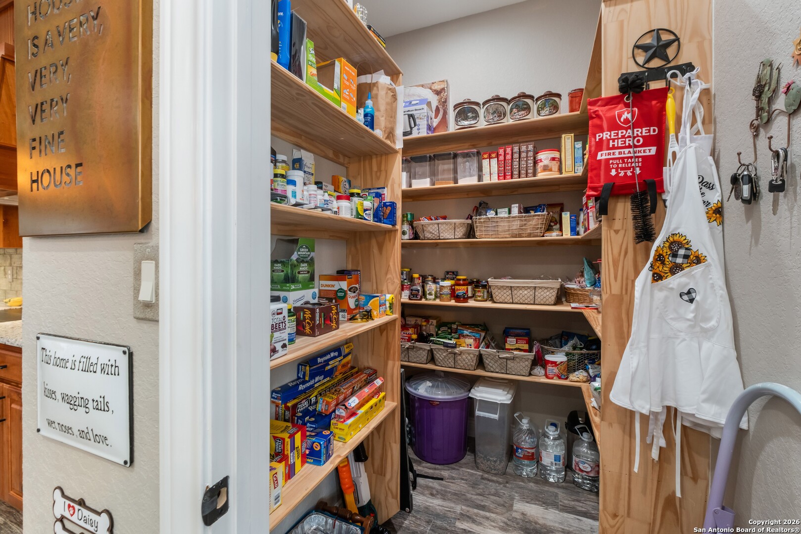 103 Rio Grande Drive Blanco, TX 78606 - Photo 21 of 99 a store room with lots of different colored cloths