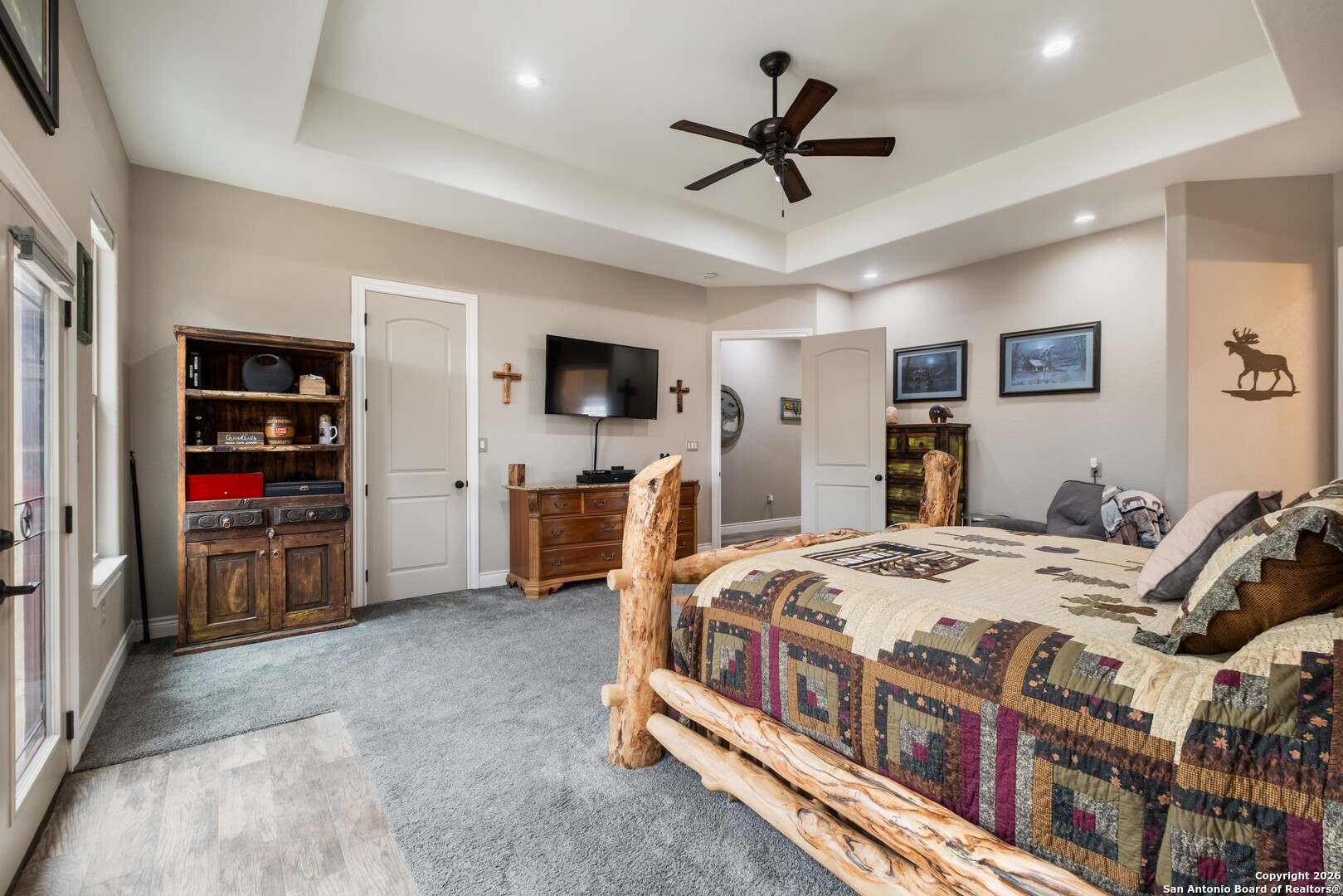 103 Rio Grande Drive Blanco, TX 78606 - Photo 23 of 99 a bedroom with furniture and a flat screen tv
