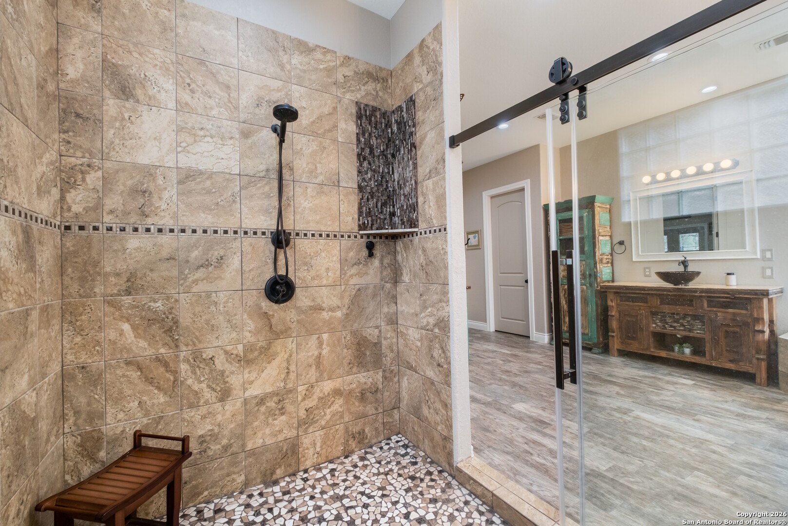 103 Rio Grande Drive Blanco, TX 78606 - Photo 28 of 99 a bathroom with a shower and a sink