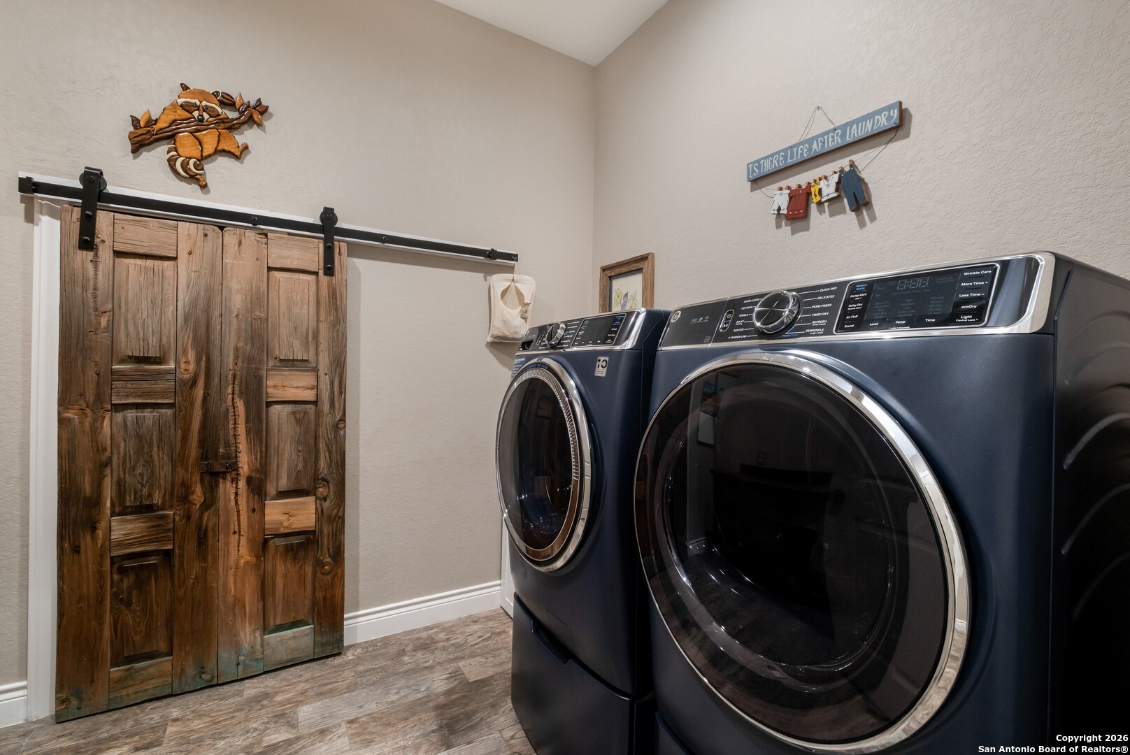 103 Rio Grande Drive Blanco, TX 78606 - Photo 43 of 99 a utility room with dryer and washer