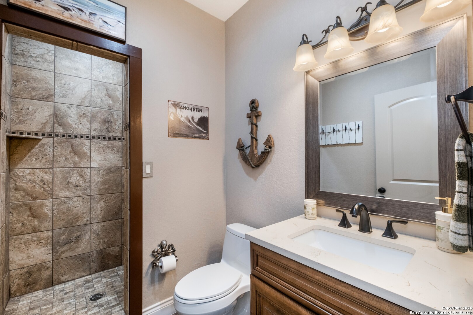 103 Rio Grande Drive Blanco, TX 78606 - Photo 51 of 99 a bathroom with a sink a toilet and shower