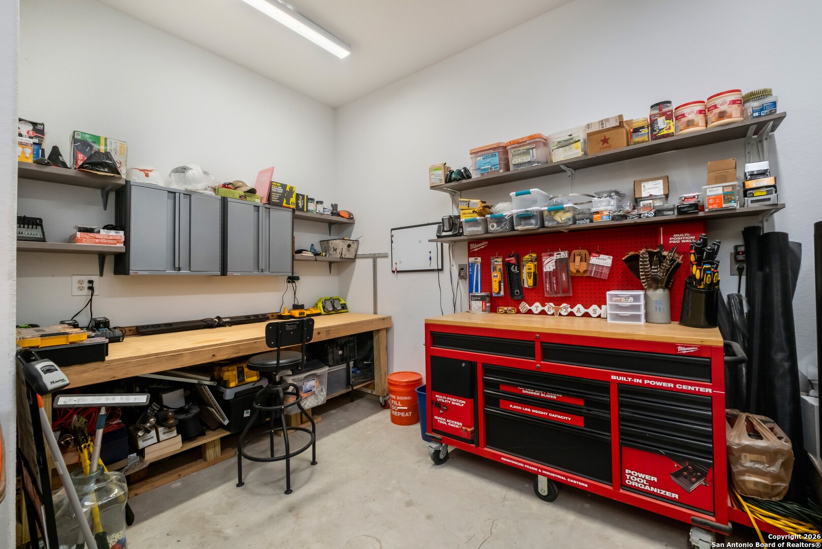 103 Rio Grande Drive Blanco, TX 78606 - Photo 54 of 99 a room with furniture and a flat screen tv