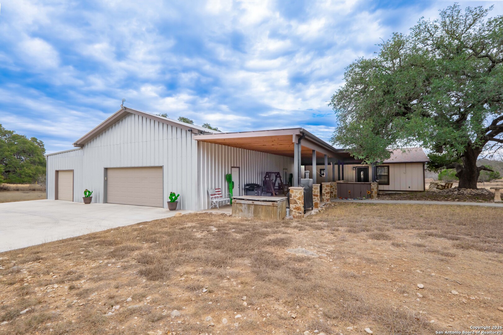 103 Rio Grande Drive Blanco, TX 78606 - Photo 67 of 99 a house view with a sitting space and garden