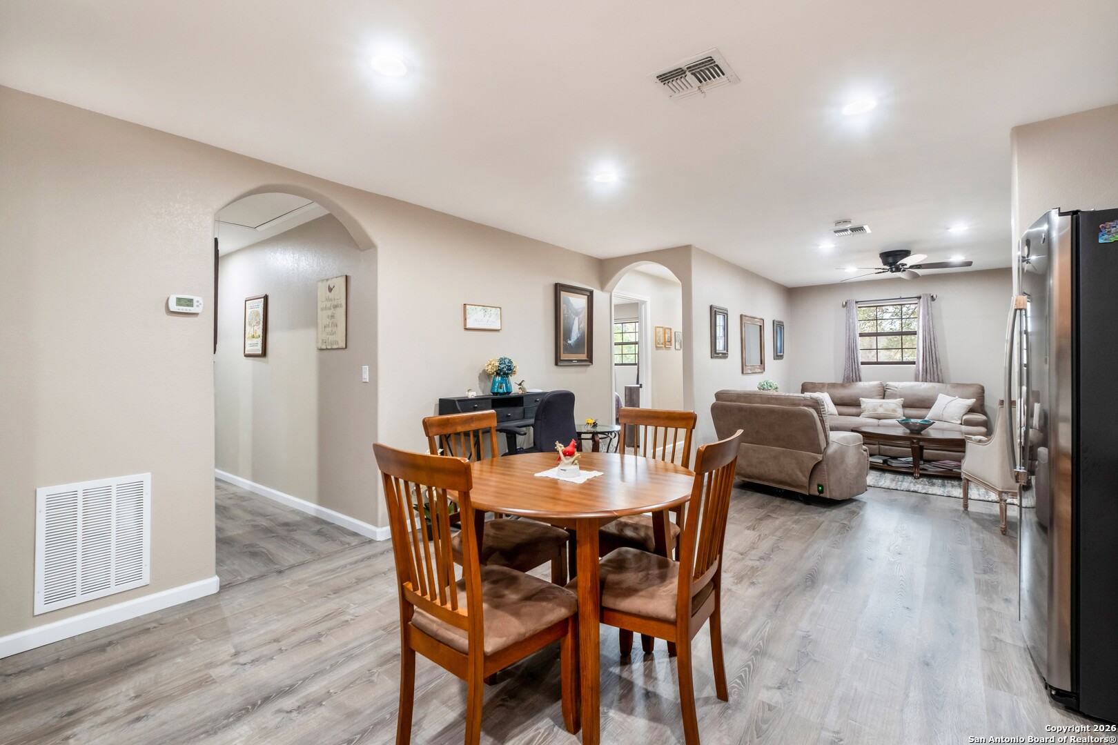 103 Rio Grande Drive Blanco, TX 78606 - Photo 76 of 99 a view of a dining room with furniture and wooden floor