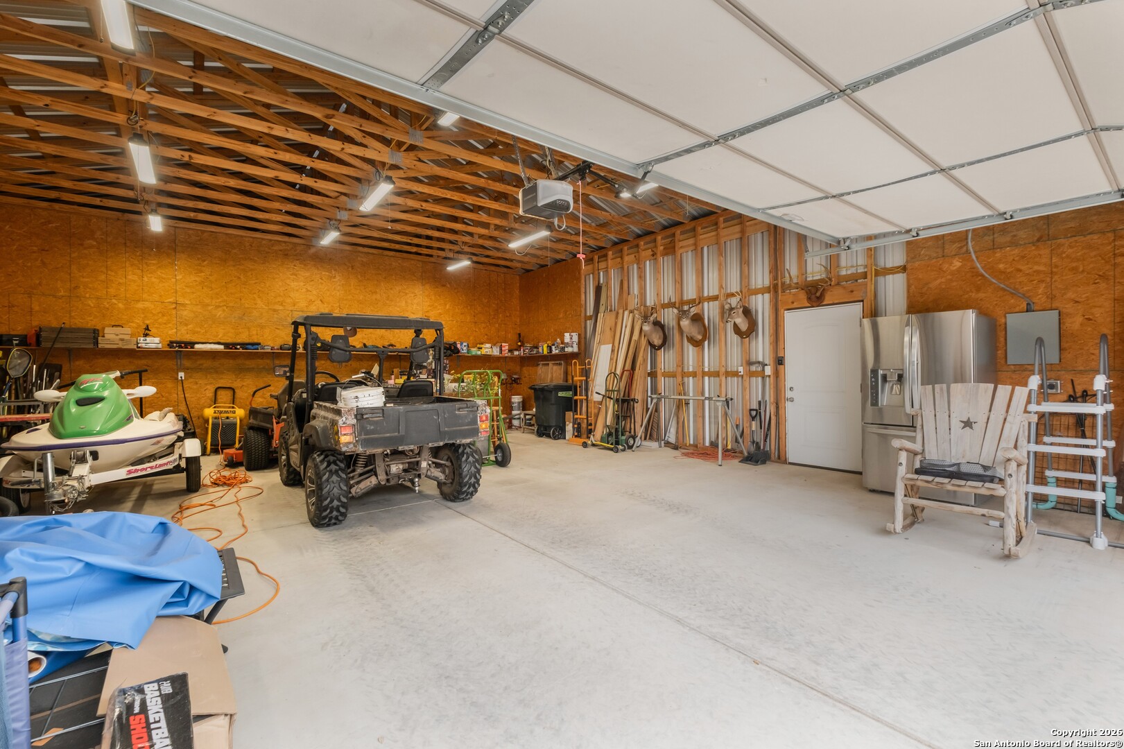 103 Rio Grande Drive Blanco, TX 78606 - Photo 91 of 99 a view of a garage with chairs