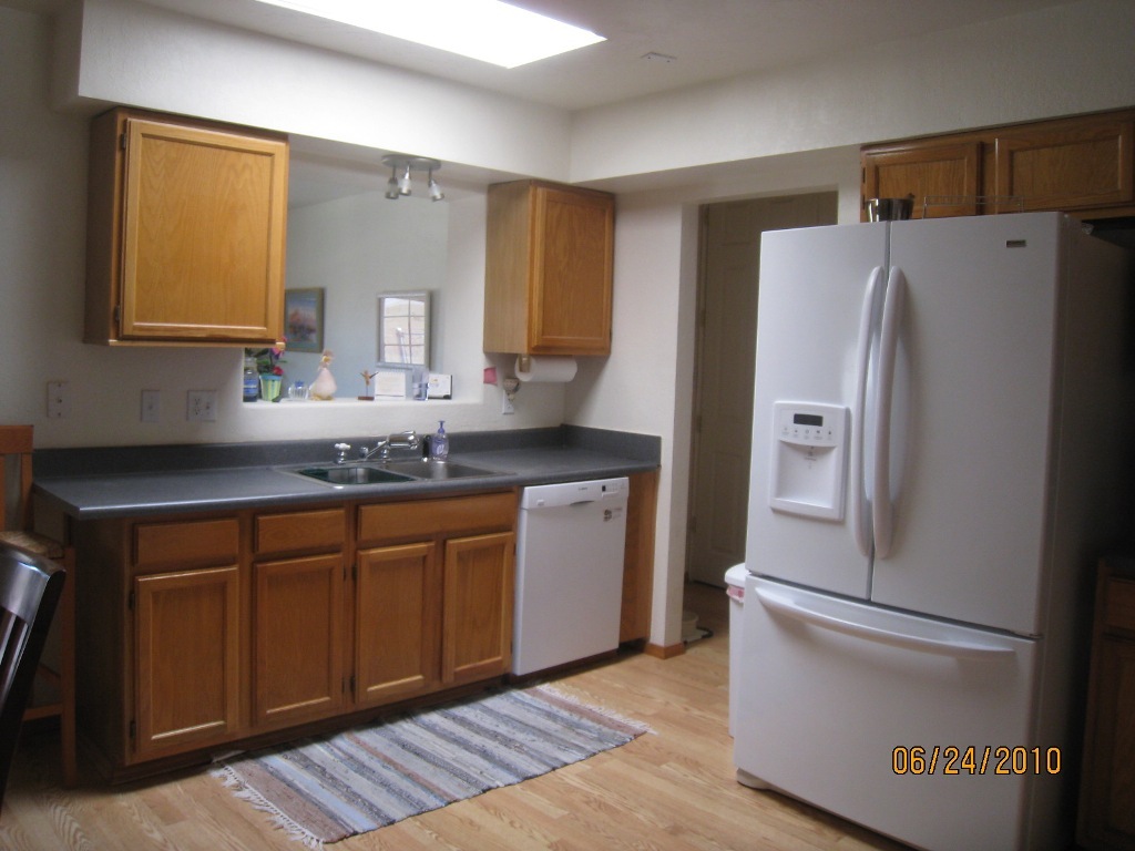 1420 West Utopia Road Phoenix, AZ 85027 - Photo 7 of 23 Kitchen sink with skylight