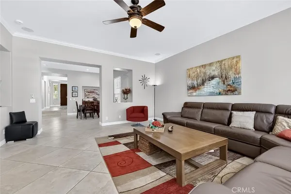 a work place with furniture and a window