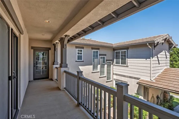 an aerial view of a swimming pool patio fire pit and outdoor seating