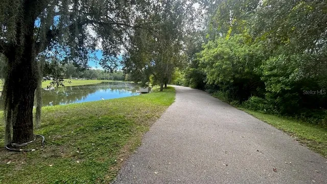 a view of a lake with a yard