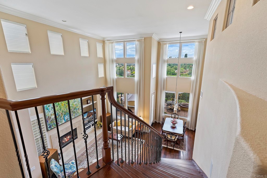 7057 Eider Court Carlsbad, CA 92011 - Photo 37 of 65 a view of a balcony with wooden floor
