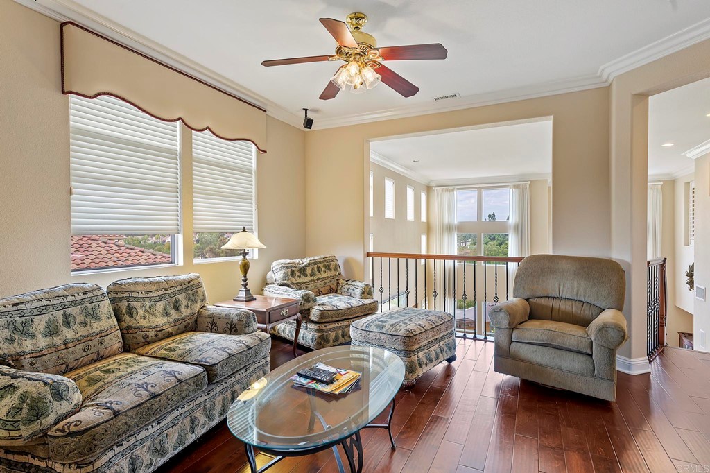7057 Eider Court Carlsbad, CA 92011 - Photo 39 of 65 a living room with furniture and a large window