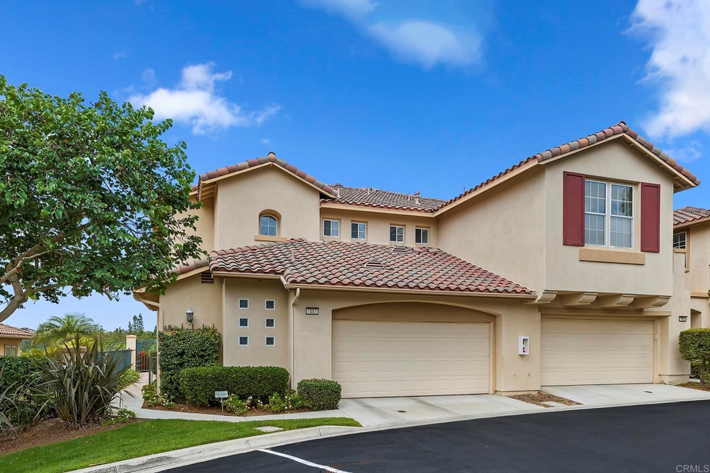7057 Eider Court Carlsbad, CA 92011 - Photo 5 of 65 a house view with a garden space